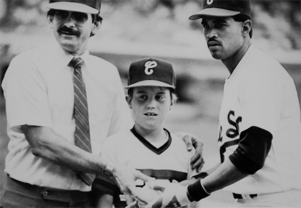 History professor Matt Hinckley, center, poses with his dad, left, with Ozzie Guillen, right, before an 1987 White Sox game.