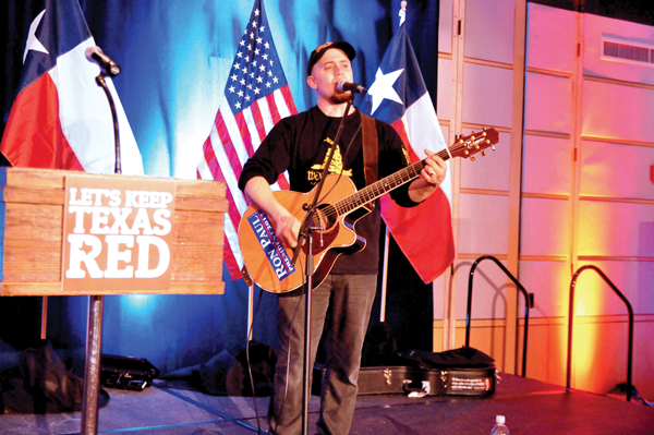 GUILLERMO MARTINEZ/THE ET CETERA Jordan Page performs for the Republican watch party at the Dallas Arboretum on election night Nov. 4.