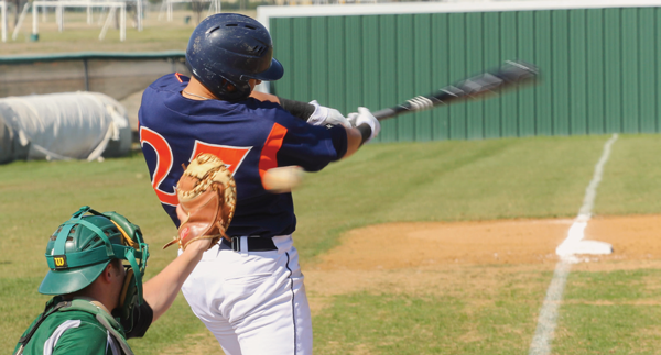 JONATHAN WENCES/THE ET CETERA
Sophomore Outfielder Mason Arasato swings big in Harvester’s win.