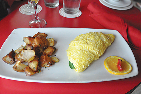 The omelette provencale from Toulouse Café and Bar is served with herbed potatoes. Photo by Courtney Schwing/The Et Cetera.