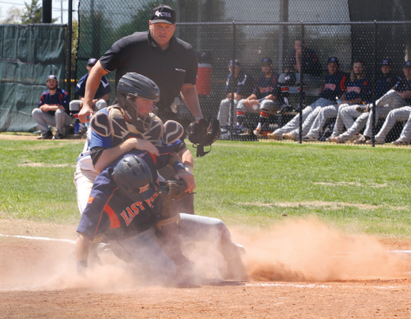 Freshman shortstop Casey Maack slides into home plate against Mountain View. Photo by Jonathan Wences/The Et Cetera