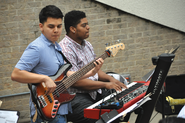 Ezequiel Alcala plays bass alongside keyboardist Kuinton Gray during the Jazz Under the Stars event for Literary and Fine Arts Festival. Photo by Ana Gallegos/The Et Cetera.