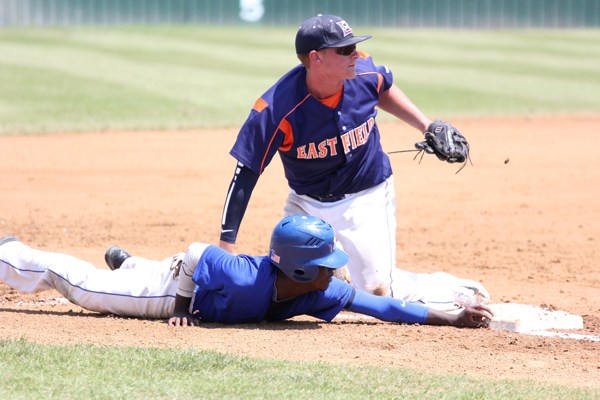Blayten Magana tags a Mountain View runner out at third after a botched attempt to steal in the first game of the double header on May 2. The runner slid and missed the bag. Photo by James Hartley/The Et Cetera.