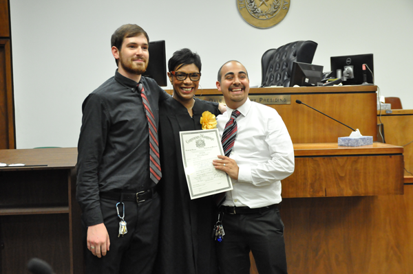 Austin (left) and Joshua celebrate their mariage with Judge Dominique Collins in the George Allen Sr. Courts Building. They had not decided on a shared last name. (Photo by Anna Gallegos/The Et Cetera)