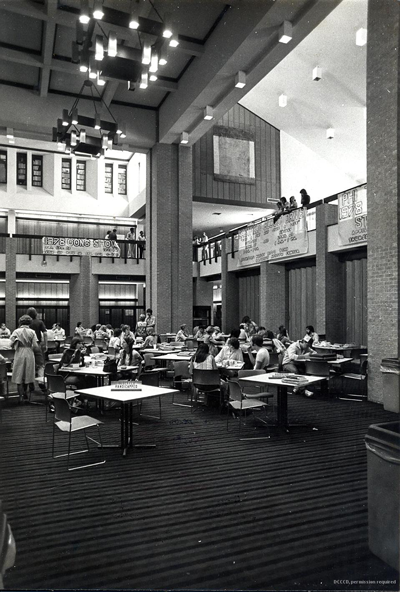 PHOTOS COURTESY OF DCCCD HISTORICAL ARCHIVES Clockwise from top left: history faculty member Tim Hughes assists a student during registration. The library circa 1970. Students in line during spring semester registration. Students in the Pit Circa 1978. Eastfield College Vice President Byron McClenney looks over the construction of Eastfield.