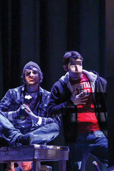 Micah Cavender, left, and Victor Deterra rehearse for a one-act version of “Alice in Wonderland.