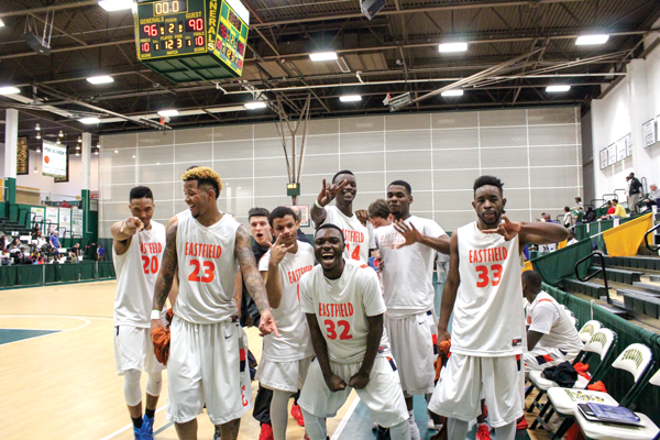 The Harvesters celebrate after beating Mohawk Valley in overtime 96-90 March 12. They finished first in the nation in points (3,435), points per game (101) and field goals made per game (37). PHOTO BY BRIANNA HARMON/THE ET CETERA.