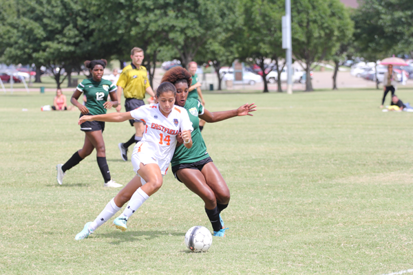 James Hartley/The Et Cetera Karla Gutierrez blocks a defender in Eastfield Soccer's Sept. 13 game 