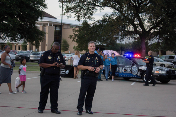 Captain Timothy Ellington (left) and Chief Michael Horak of the Eastfied Police attend National Night Out on campus. Photo by Jonathan Wences/The Et Cetera
