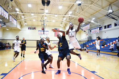 D’Angelo Streeter leaps for a layup in the Harvesters 141-74 win over Paul Quinn College on Nov. 4. Photo by Andrew Gonzales.