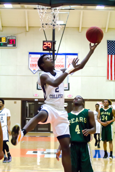 Andre Watts goes for a layup, securing a 94-88 win against Brookhaven. Photo by Yesenia Alvarado.