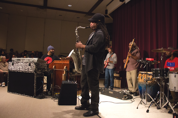 Bobby Sparks, an Eastfield alumnus who credits the college for giving him the skills he needed to win multiple Grammy Awards, performs Feb. 1 with his band in F building. Photo by David Sanchez.