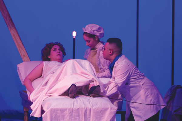 Left to right, Albamar Seguinot, Giavannia Ramos and Vinnie
Serionel perform “In the Next Room, or the Vibrator Play.”  Photo by David Silva/ The Et Cetera