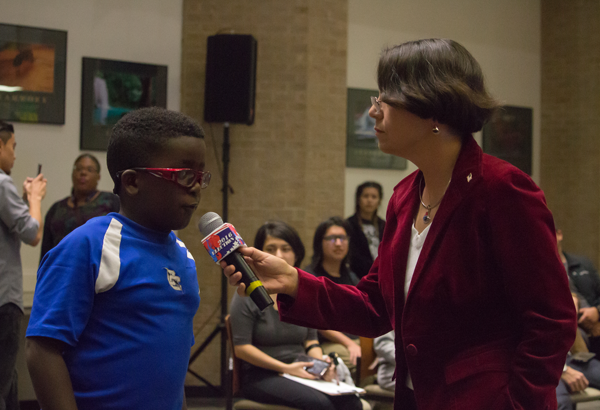 Cindy Casteneda interviews people at the Nov. 8 2016 election night watch party. Photo by Jasmin Jimenez.