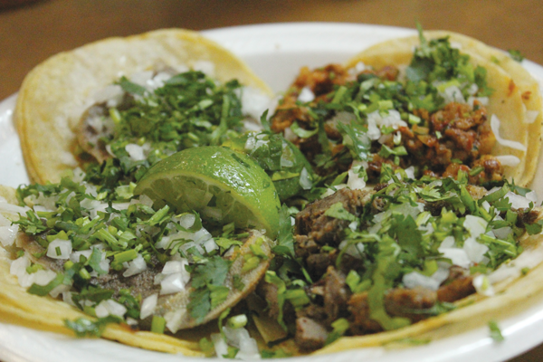 Tacos La Banqueta Puro DF has delicious pastor, suadero and lengua tacos. Photo by David Silva.