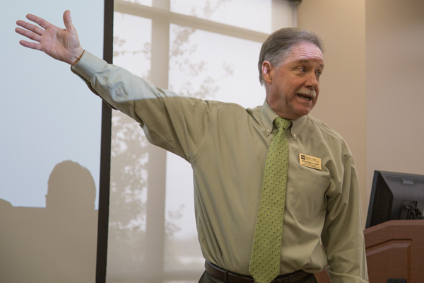 Mike Walker, interim vice president at Eastfield College, addresses student concerns over the colleges planned transition from 16 week courses to eight week courses Nov. 16. The transition has been met with mixed reaction from faculty and students alike. Photo by James Hartley/The Et Cetera 