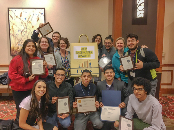 The Et Cetera staff celebrates their Pacemaker Awards during the National Media Convention on Oct. 29, 2017. 