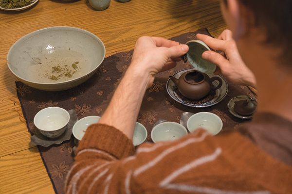 Jeff Cornelius serves tea with antique teaware and a technique called Gong Fu: the practice of making tea. Photo by Jesus Ayala/The Et Cetera