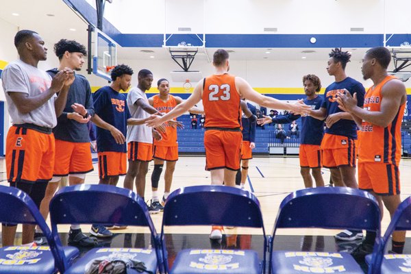 Garriga prepares to take the court. He leads the Harvesters in rebounds, averaging 9 rebounds per game.  Photo by Yesenia Alvarado/The Et Cetera