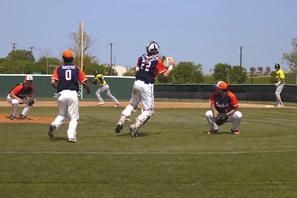 Catcher Ryan Dempsey throws to second hoping to get an out in Eastfield’s April 12 game against Brookhaven. The Harvesters lost the game 8-6. Photo by Yesenia Alvarado/The Et Cetera