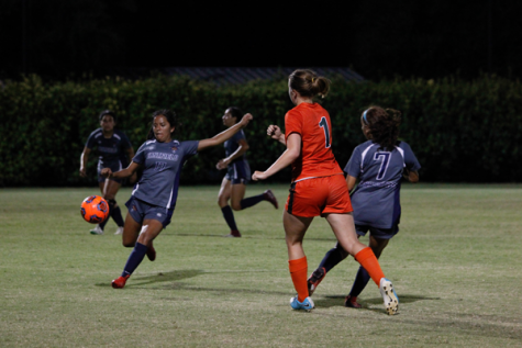 Freshman Carolina Duran kicks the ball downfield to a teammate in a game against The University of Texas at Dallas on Aug. 20. Photo by Rory Moore/The Et Cetera