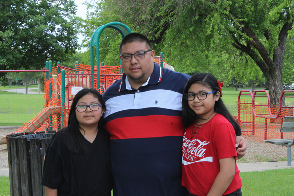 Family is essential: Single father, student, warehouse worker adjusts to new routines