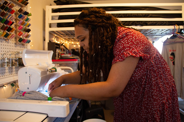 Myers-LeCroy Scholarship winner Alaysia Richardson runs her sewing business, A. Danae Designs, from her bedroom. Photo by Rory Moore/The Et Cetera