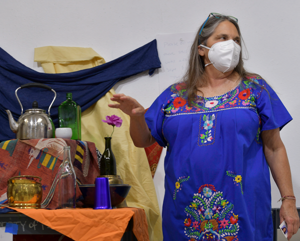 Art professor Kathy Windrow instructs her class on how to take photos of their art on Oct. 4. Photo by Chantilette Franklin/ The Et Cetera