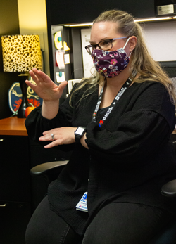 American Sign Language interpreter Danielle Box attends classes with hearing impaired students and signs the material for them. Photo by Rory Moore/The Et Cetera