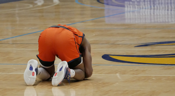 Jamari Robertson mourns Eastfield's one point loss to Genesee on Friday night.