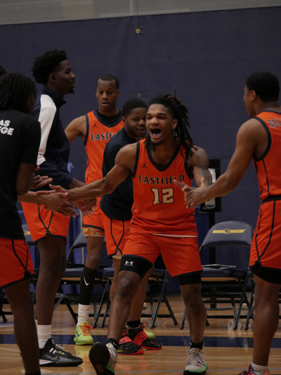 Geontay Davis celebrates the Harvesters Thursday night win against Rhode Island. Photo by Manny Willis/The Et Cetera