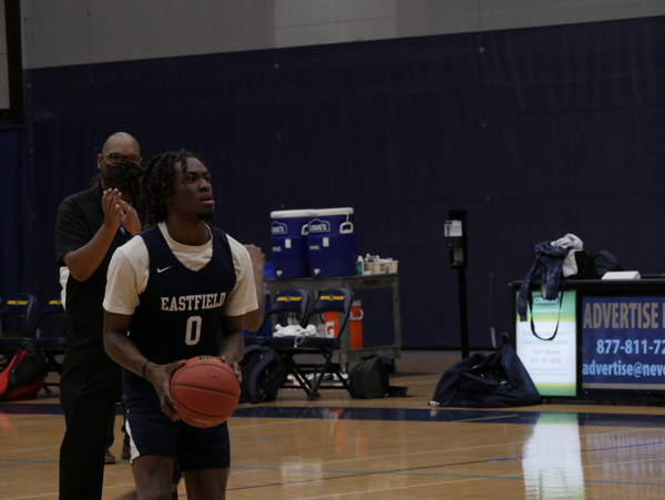 Forward Keshon Weakley warms up as the team set up to practice for the first game of the national tournament. Photo by Manny Willis/The Et Cetera