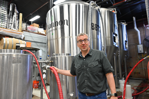 Peter Boettcher 
teaches about the mechanisms
in the process of brewing at Shannon Brewery on April 18. Photo by Rory Moore/The Et Cetera