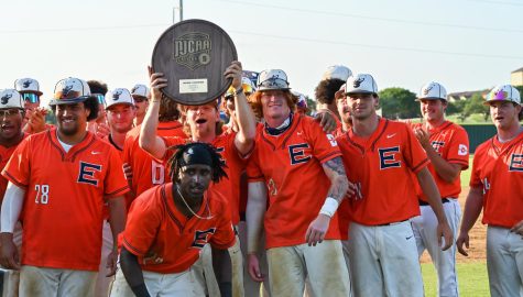 The Eastfield Harvesters baseball team celebrate with their trophy after winning the district championship on May 14. 