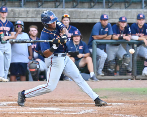 Eastfields Khalon Clayton swings at a pitch against Caldwell. 