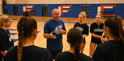 Eastfield volleyball coach Phil Nickel speaks with the team after practice in the gymnasium on September 6.