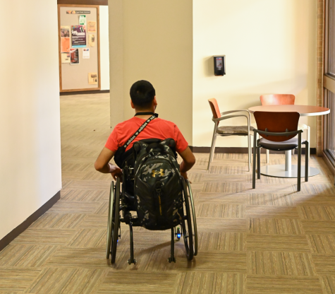 Jose Cardoso moves through the hallway of the F building at Eastfield. 