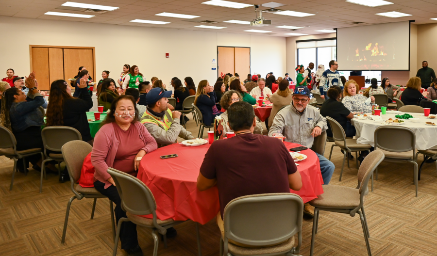 Faculty members of Eastfield gather on Dec. 8 inside S101 for the Holiday Luncheon.