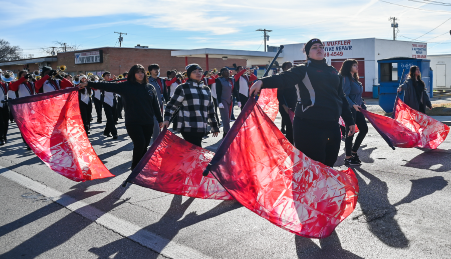 Members of the John Horn High School Jaguar Band perform while marching through Mesquite to celebrate Dr. Martin Luther King Jr.