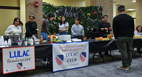 Members of the LULAC student club serve food to students and faculty while holding a fundraiser on Jan. 19 in the Hive.  