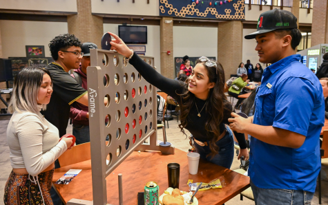 students playing connect 4.