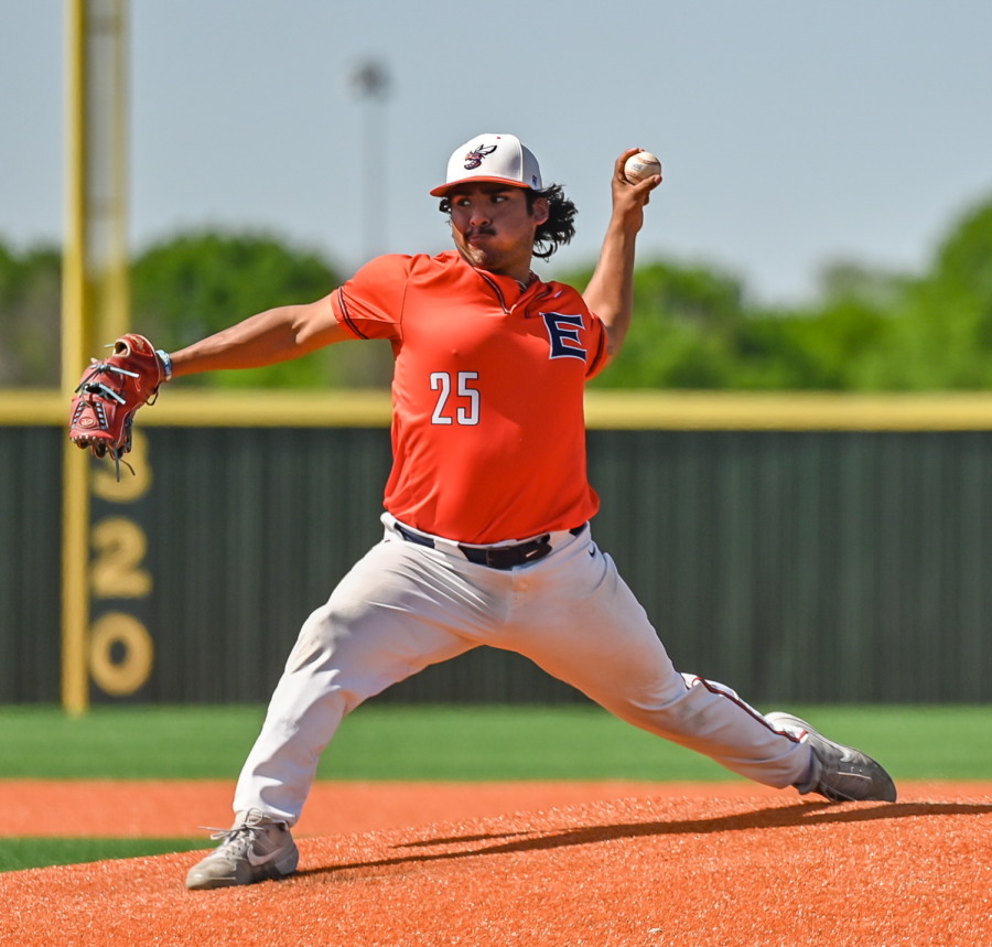 Stephen Pena pitches a baseball