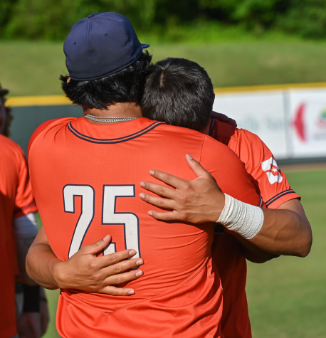 Stephen Pena and Jose Ramirez console each other.