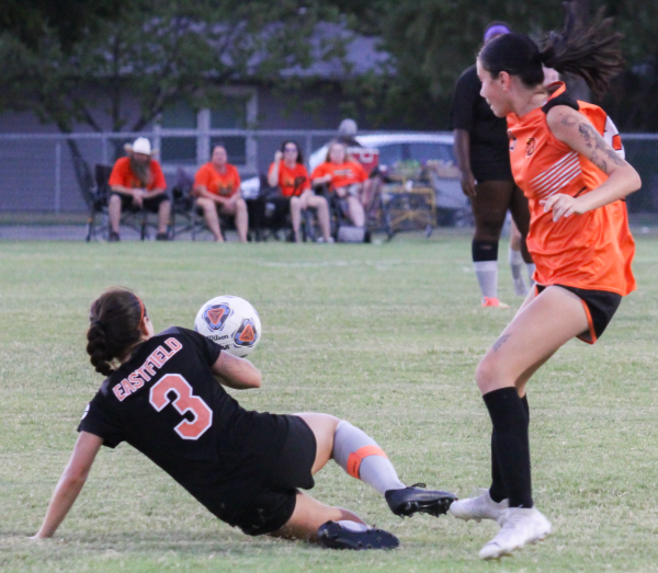 Sophie Palomino slides to get the ball.