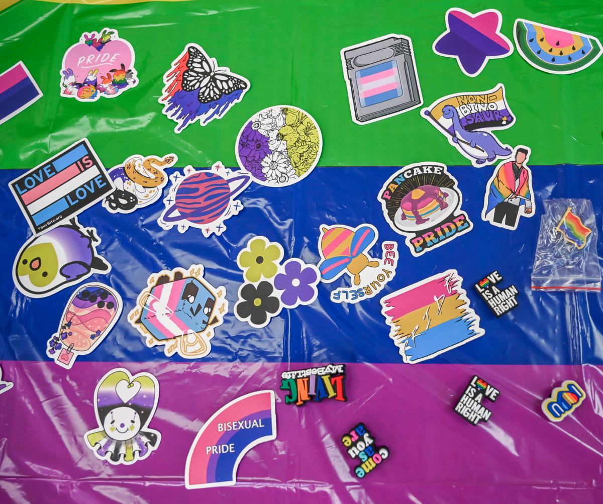 Stickers with themes of LGBTQ+ pride were given at the student mixer.