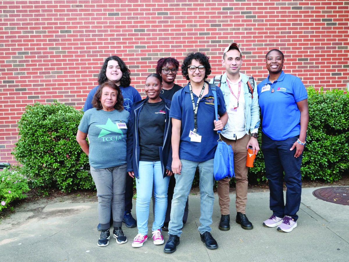 Professor Taylor with student staff of The Et Cetera at the TCCJA 
Convention earlier this month.