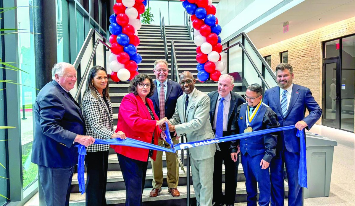 President Tealer helps cut the ribbon for the new B building at Eastfield earlier this year.