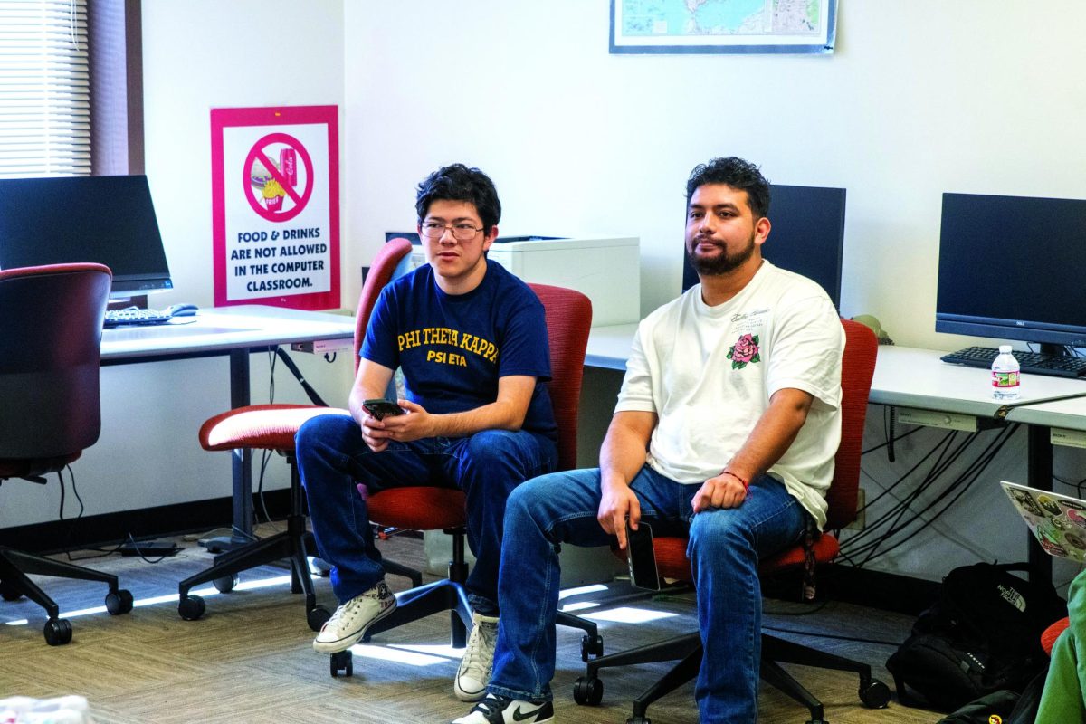 PTK members Erick Campuzano and Jaime Campos prepare to work. 