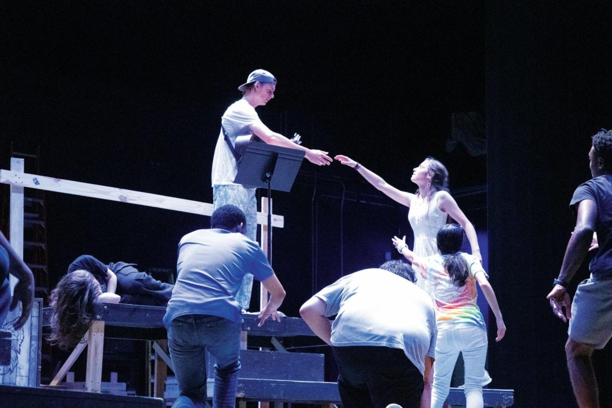 Students rehearse a scene from the "The Great and Terrible Oz."