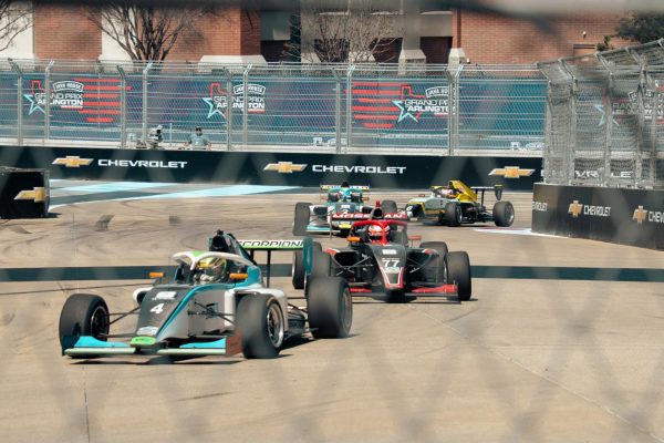 IndyCars race through the course on Saturday, March 14.